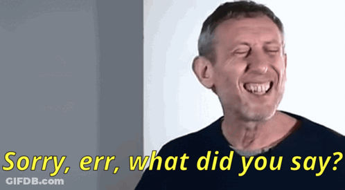A Man Is Laughing With The Words Sorry Err What Did You Say GIF
