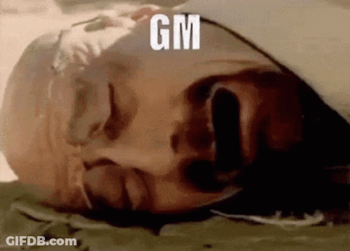 A Man Is Laying Down With His Eyes Closed And A Tear Coming Out Of His Nose . GIF