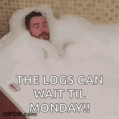A Man Is Laying In A Bathtub Filled With Foam And The Words `` The Logs Can Wait Till Monday '' . GIF