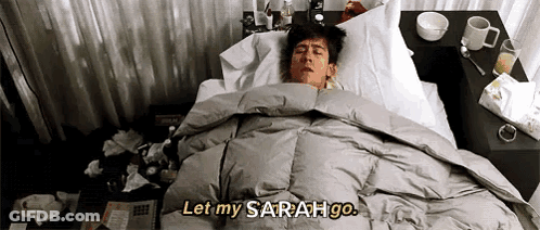 A Man Is Laying In A Bed With A Blanket And Says Let My Sarah Go GIF