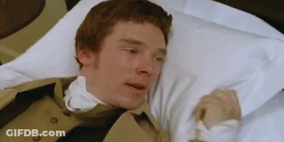 A Man Is Laying In A Hospital Bed With A Bandage On His Neck And A White Pillow . GIF