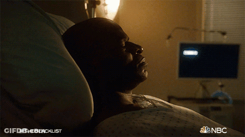 A Man Is Laying In A Hospital Bed With The Nbc Logo On The Bottom Right GIF