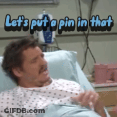 A Man Is Laying In A Hospital Bed With The Words Let 'S Put A Pin In That Above Him GIF