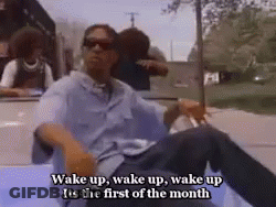 A Man Is Laying In The Back Of A Car With The Words Wake Up Wake Up Wake Up Its The First Of The Month GIF