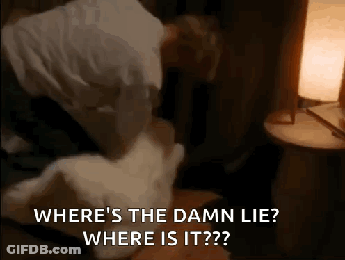 A Man Is Laying On A Bed With A Pillow And A Lamp And Says Where 'S The Damn Lie ? GIF