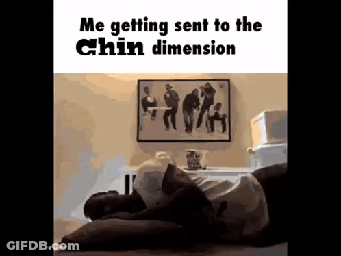 A Man Is Laying On A Bed With His Head On A Pillow And A Picture On The Wall Behind Him . GIF