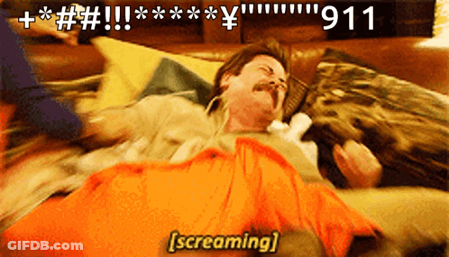 A Man Is Laying On A Bed With The Number 911 Written On The Bottom GIF
