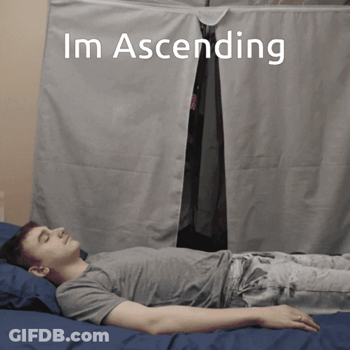 A Man Is Laying On A Bed With The Words Im Ascending Written Above Him GIF