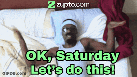 A Man Is Laying On A Bed With The Words Ok Saturday Let 'S Do This On The Bottom GIF