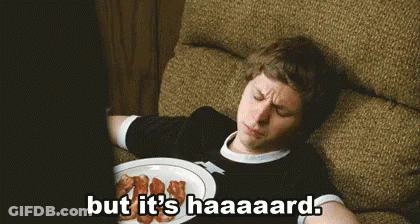 A Man Is Laying On A Couch With A Plate Of Bacon And The Words But It 'S Haaaaard . GIF