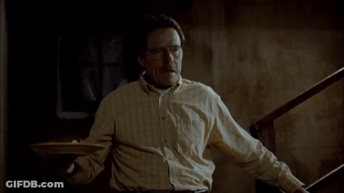 A Man Is Laying On The Floor With A Plate On The Floor GIF
