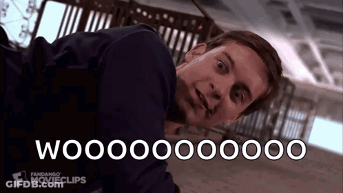 A Man Is Laying On The Floor With The Words Woooooo Written On The Bottom Of His Face . GIF