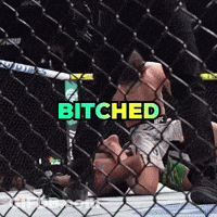 A Man Is Laying On The Ground In A Boxing Ring With The Word Bitches Above Him GIF