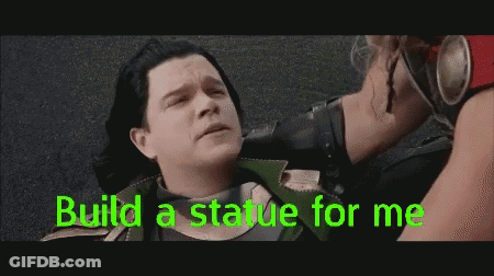 A Man Is Laying On The Ground With The Words Build A Statue For Me GIF