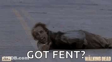 A Man Is Laying On The Ground With The Words `` Got Fent '' Written Above Him . GIF