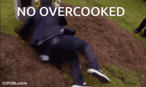 A Man Is Laying On The Ground With The Words No Overcooked Above Him GIF