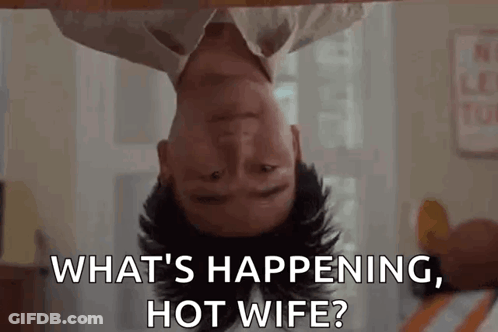 A Man Is Laying Upside Down On A Bed And Asking What 'S Happening , Hot Wife . GIF