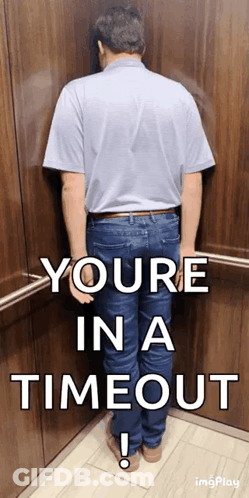 A Man Is Leaning Against A Wall In An Elevator With The Words " Youre In A Timeout " Below Him GIF