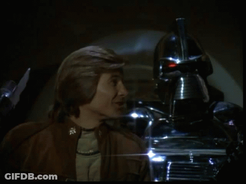 Man Lighting Cigarette Before Silver Robot GIF
