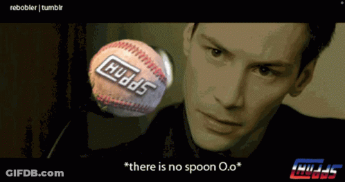 A Man Is Looking At A Baseball That Says Huds On It GIF