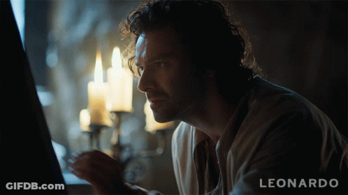 A Man Is Looking At A Computer Screen With The Name Leonardo On The Bottom GIF