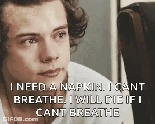 A Man Is Looking At Himself In The Mirror And Says I Need A Napkin GIF