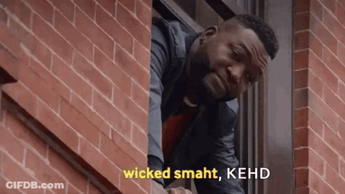 A Man Is Looking Out Of A Window And Says `` Wicked Smaht , Kehd '' GIF