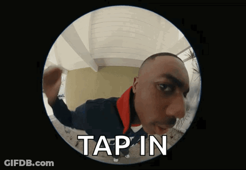 A Man Is Looking Through A Peephole And The Words Tap In Are On The Screen GIF