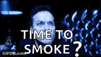 A Man Is Looking Up At The Sky With The Words `` Time To Smoke '' Written On The Screen . GIF