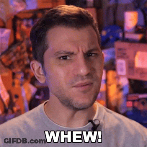 A Man Is Making A Face And Says Whew In Black Letters GIF