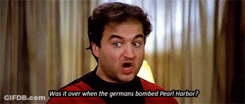 A Man Is Making A Funny Face And Asking Was It Over When The Germans Bombed Pearl Harbor . GIF