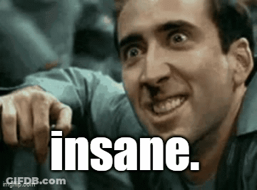 A Man Is Making A Funny Face And Pointing At The Camera With The Words `` Insane '' Above Him . GIF