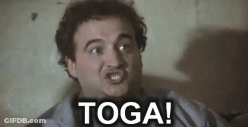 A Man Is Making A Funny Face And Saying Toga ! GIF