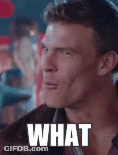 A Man Is Making A Funny Face And The Word What Is On His Face GIF