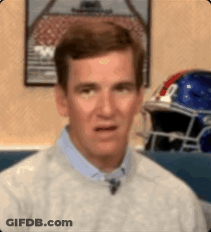 A Man Is Making A Funny Face In Front Of A Football Helmet And A Picture Of A Football Field . GIF