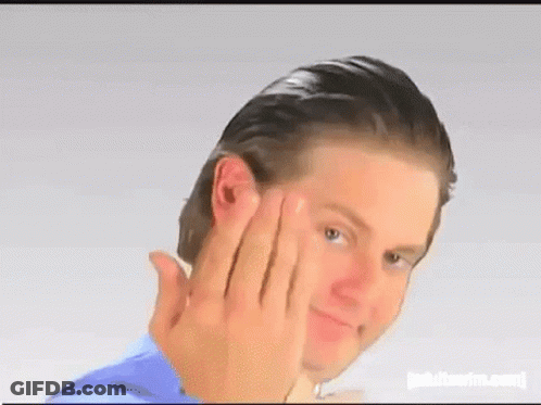 A Man Is Making A Funny Face While Touching His Face With His Hands . GIF