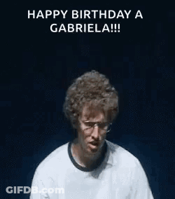 A Man Is Making A Funny Face With His Hands In The Air While Wearing Glasses . GIF