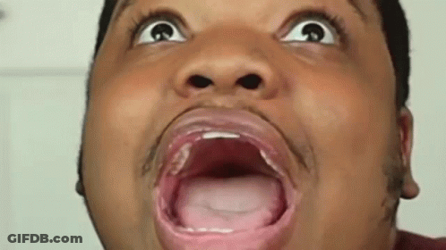 A Man Is Making A Funny Face With His Mouth Open And His Tongue Out . GIF