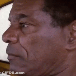 A Man Is Making A Funny Face With His Mouth Open . GIF