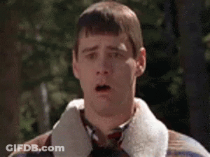 A Man Is Making A Funny Face With His Mouth Open . GIF