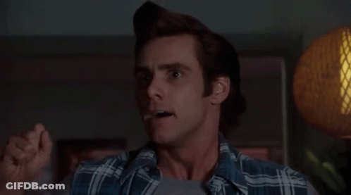 A Man Is Making A Funny Face With His Mouth Open . GIF
