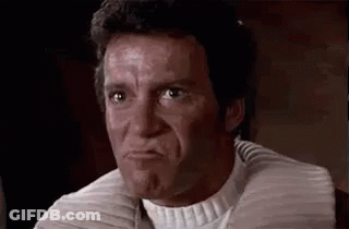 A Man Is Making A Funny Face With His Mouth Open . GIF