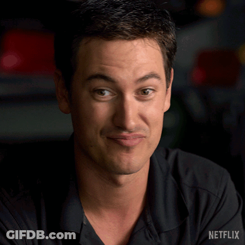 A Man Is Making A Funny Face With The Word Nope In Front Of Him GIF