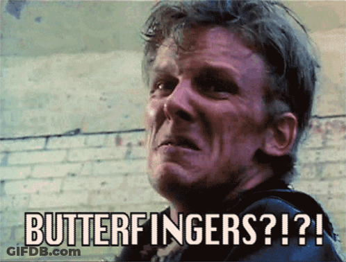 A Man Is Making A Funny Face With The Words Butterfingers Written Above Him GIF