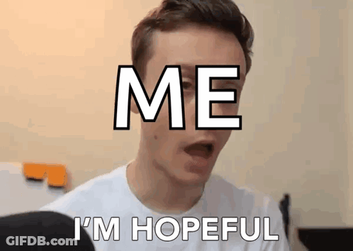 A Man Is Making A Funny Face With The Words `` Me I 'M Hopeful '' Written On His Face . GIF