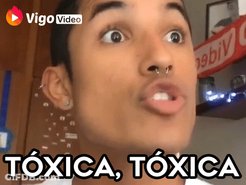 A Man Is Making A Funny Face With The Words Toxica Toxica Written Below Him GIF