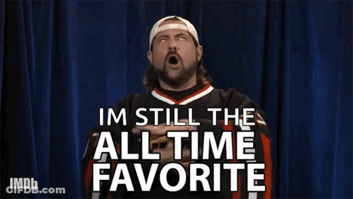 A Man Is Making A Gesture With His Hands And Says Im Still The All Time Favorite . GIF