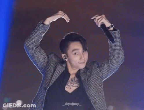 A Man Is Making A Heart Shape With His Hands And The Name Skyofmtp Is On The Bottom Right GIF