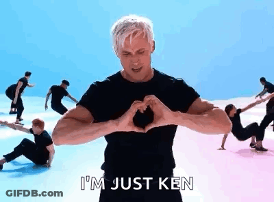 A Man Is Making A Heart Shape With His Hands In A Video . GIF