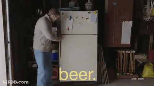 A Man Is Opening A Refrigerator That Says Beer On The Door GIF